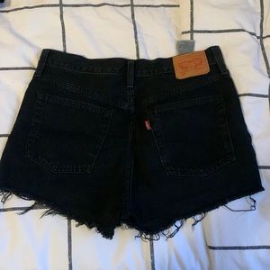 Levis black 501 shorts, 25